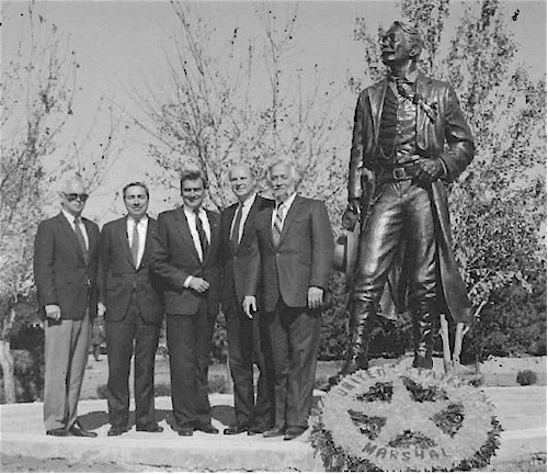 William Hall, K.M. Moore, John Bianchi, Stanley Morris, and Dave Manuel with the sculpture.