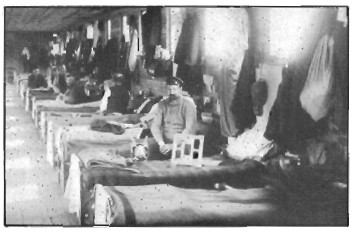 Interior view of one of  the prison camp barracks