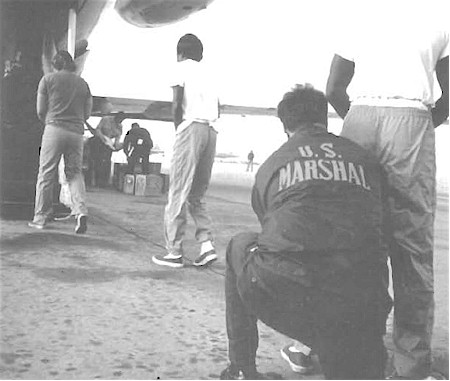 U.S. Marshals transporting prisoners via aircraft