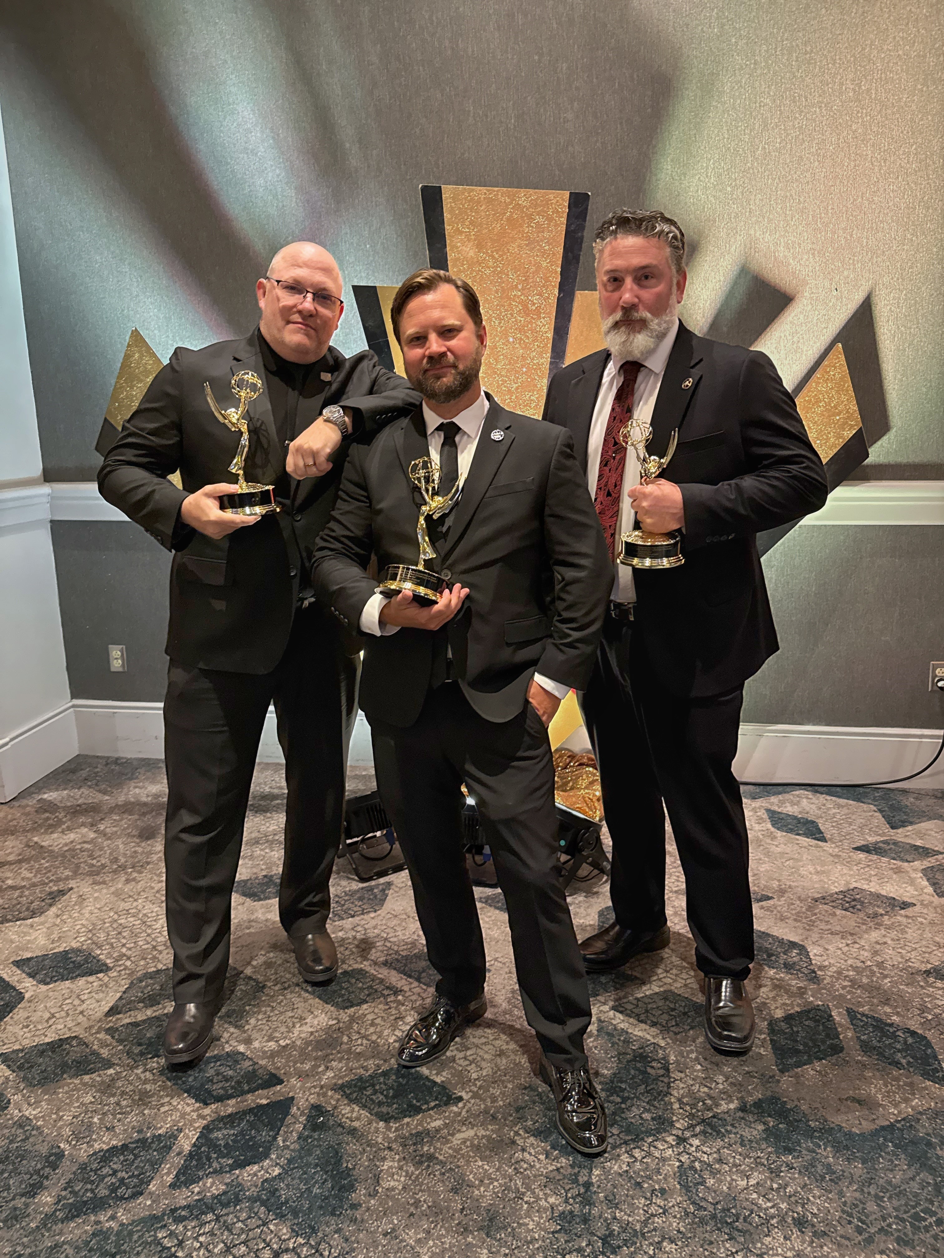 USMS Visual Production Team with Emmy award