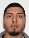 Face photo of a male fugitive Estrada Omar