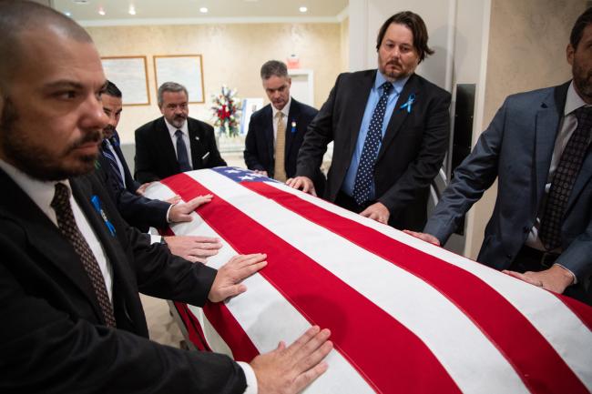 Mourners gathered around casket of fallen deputy Jared…