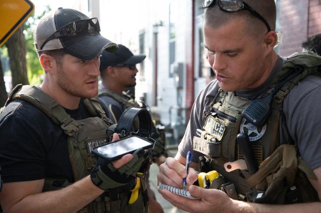 Deputy U.S. Marshals discussing Operation North Star.