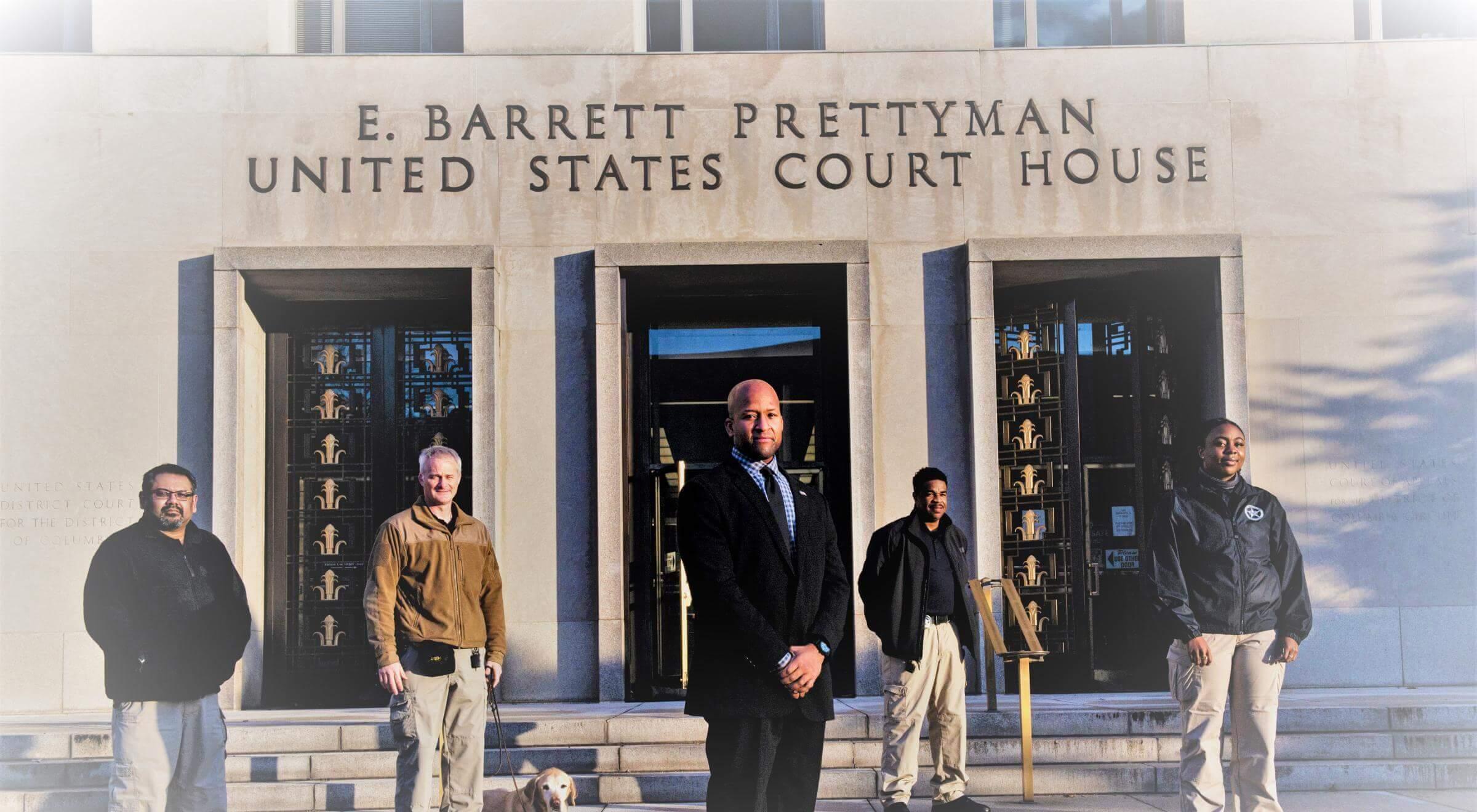 People standing outside of a courthouse