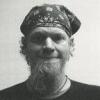 Male fugitive Jay Gardner Jordan with a scarf on head